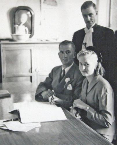 My parents sign their betrothal documents